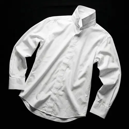 Crisp White Shirt on Black Background | Elegant Sophistication