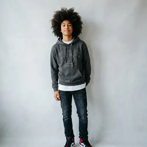 Stylish Mixed-Race Teen with Afro Hairstyle | Dynamic Personality