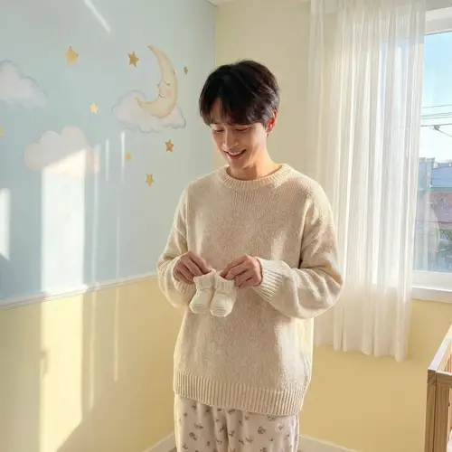 Radiant Pregnancy Photoshoot with Baby Shoes | Gentle Nursery Vibes