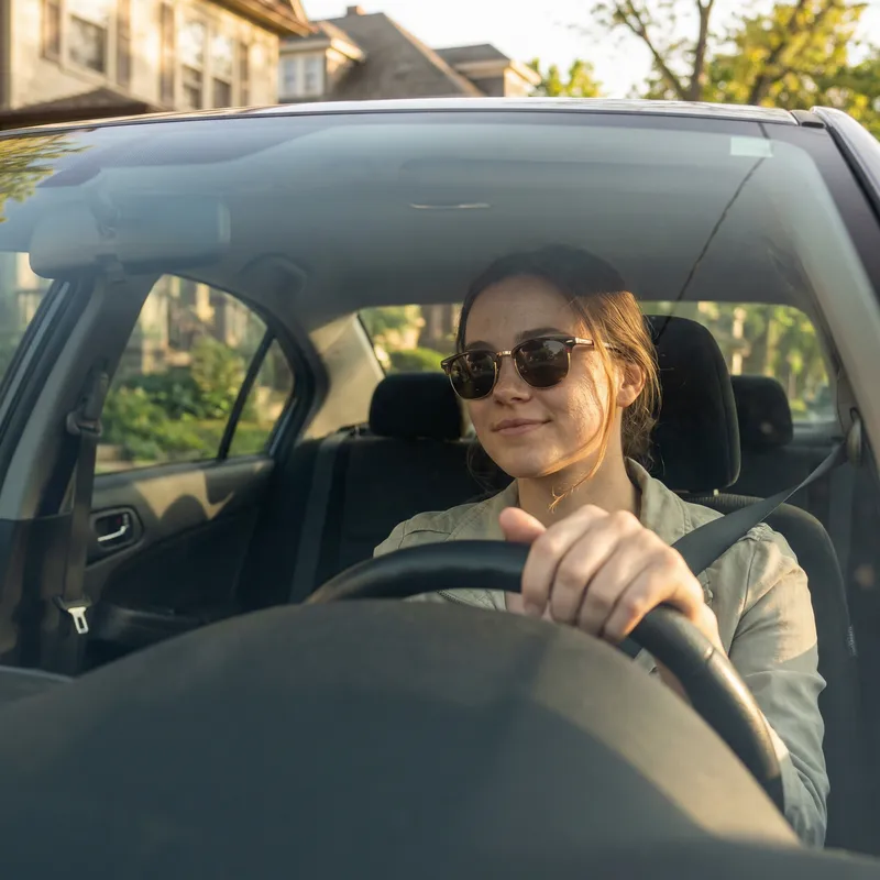 Stunning Model in Sleek Car – Natural Light Photography