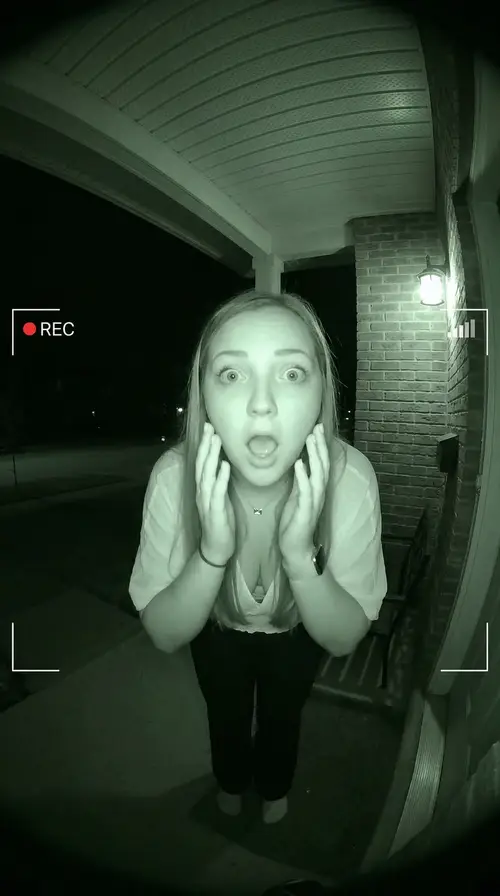 Shocked Woman on Night Doorbell Cam