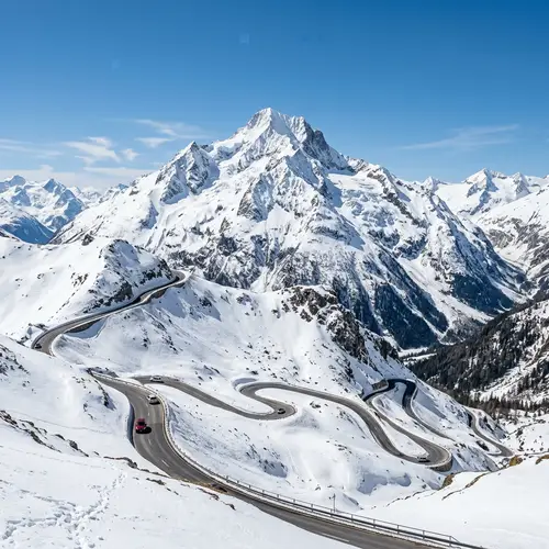 Majestic Mountain Covered in Snow | Scenic Winding Road