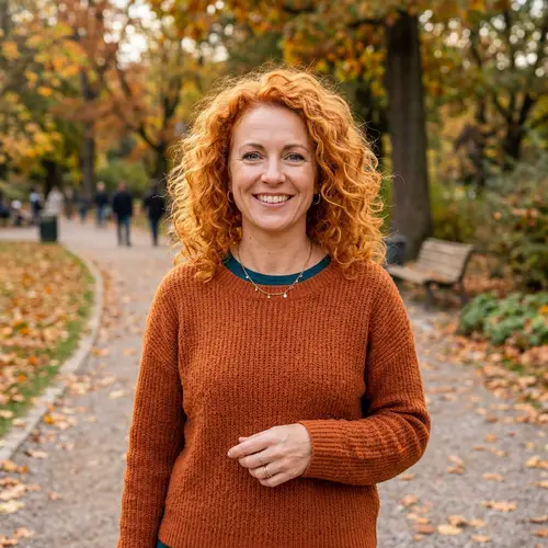 40-Year-Old Woman with Curly Orange Hair