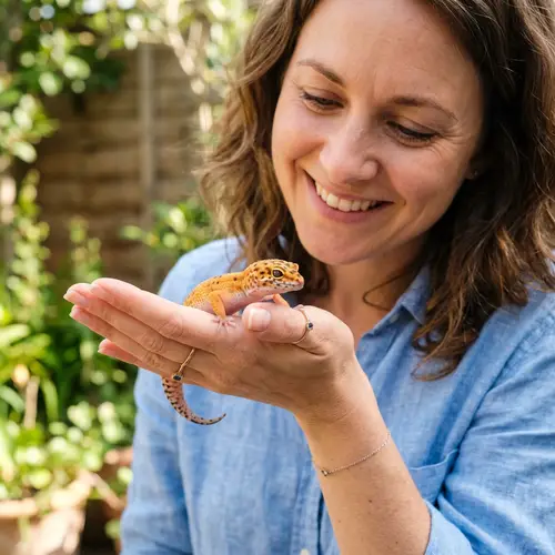 Adorable Gecko on Woman's Hand | Gentle Smile