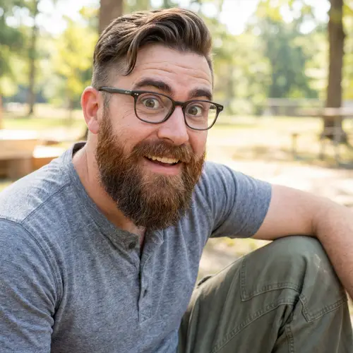 Enthusiastic Caucasian Man with Glasses and Beard