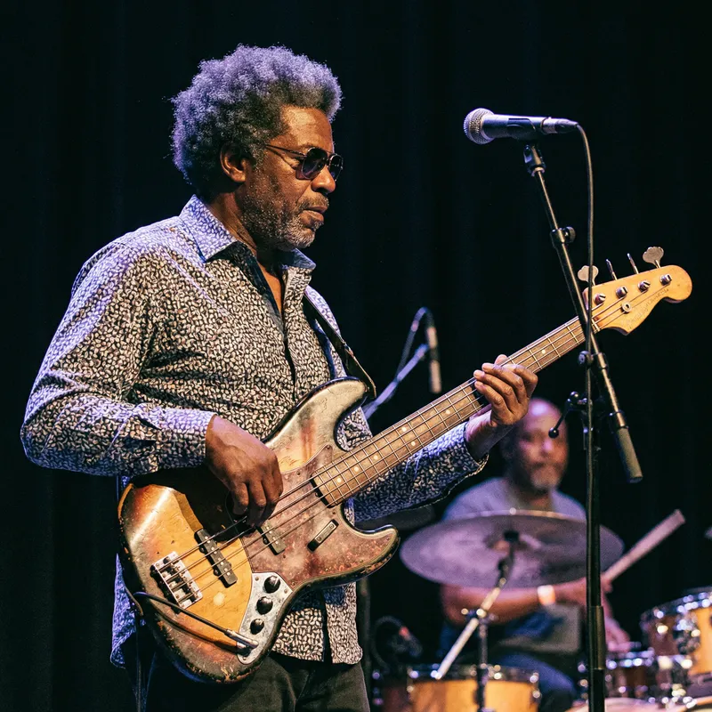 Black Male Funk Bass Player Performance