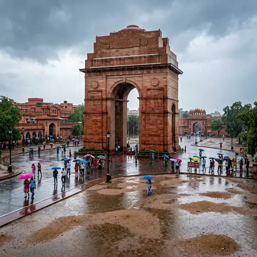 Majestic India Gate: Amidst Rain and Colorful Umbrellas