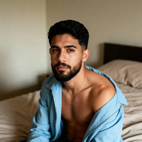 Latino Man in Bedroom: Relaxed & Stylish Look
