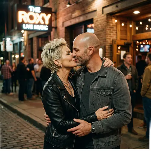Charming Rocker Couple Kissing at 55 and 43