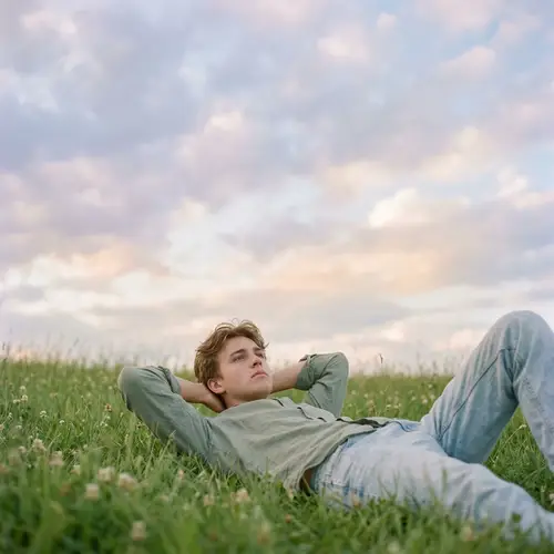 Contemplative Model on Lush Grass under Vast Sky