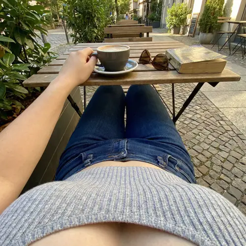 First-Person Perspective of Stylish Crop Top Outfit