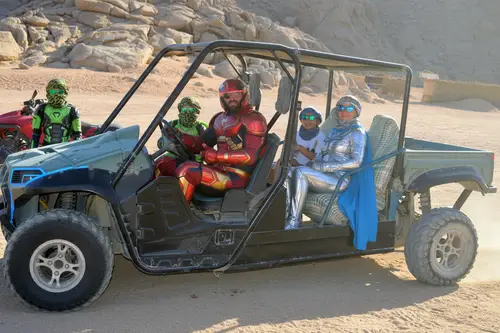 Futuristic Desert Car with Superhero Crew