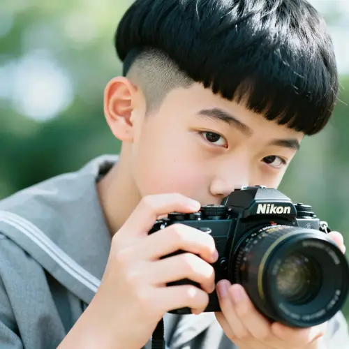 14-Year-Old Boy with Nikon Camera – Portrait Photography