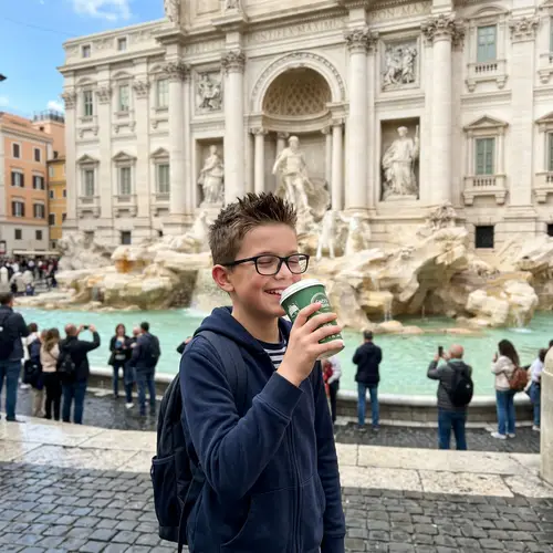 Caucasian Boy Enjoying Coffee at Trevi Fountain