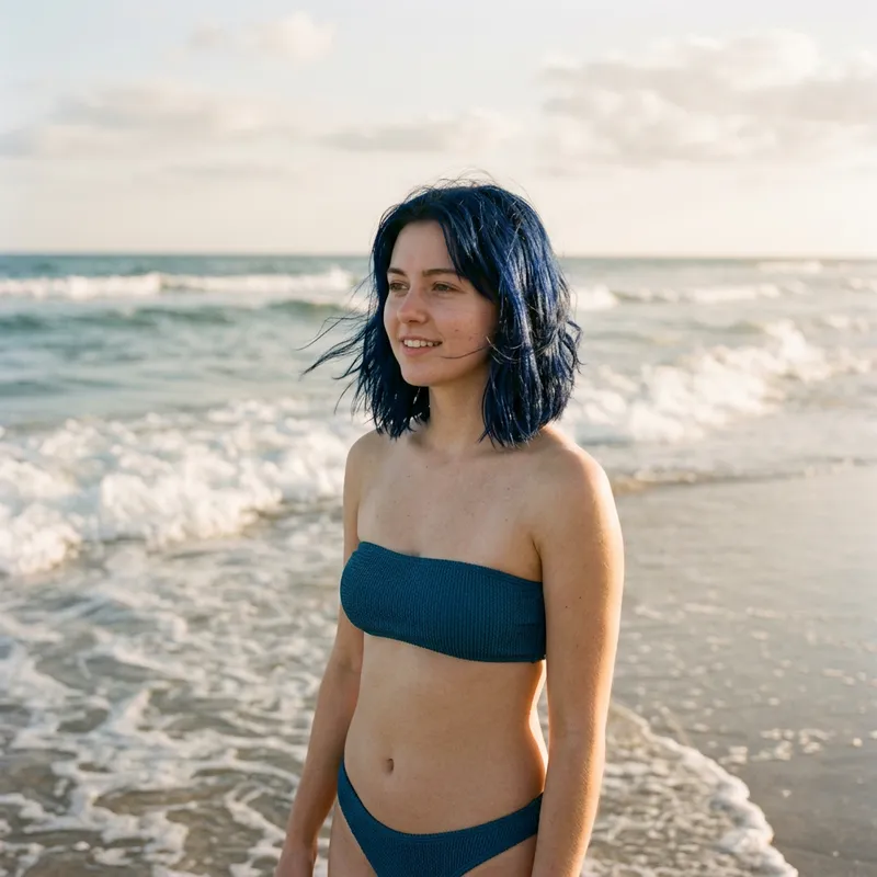 Stylish Young Woman in Dark Blue Bikini by the Beach Stylish Young Woman in Dark Blue Bikini by the Beach