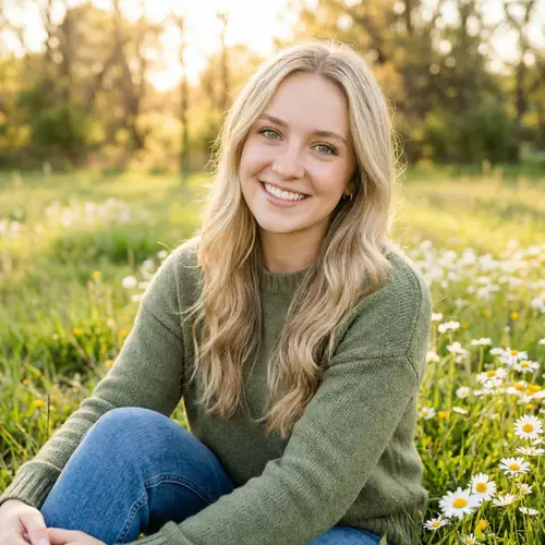 Beautiful Blonde Woman with Green Eyes and Joyful Smile