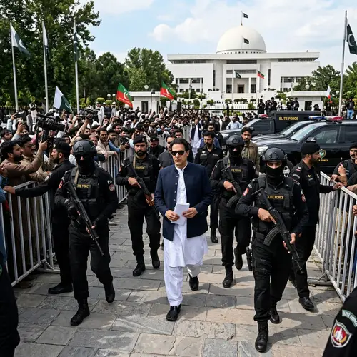Imran Khan Walking with Security Protocol