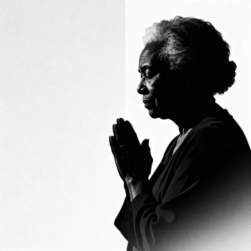 Silhouette of Praying African-American Woman