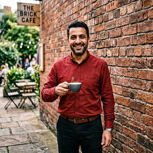 Middle-Eastern Man in Red Shirt with Coffee Cup | Website Name