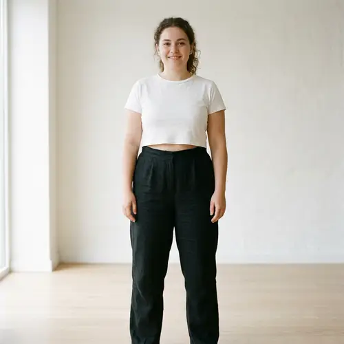 Full-Figured Young Woman in Crop Top & Pants