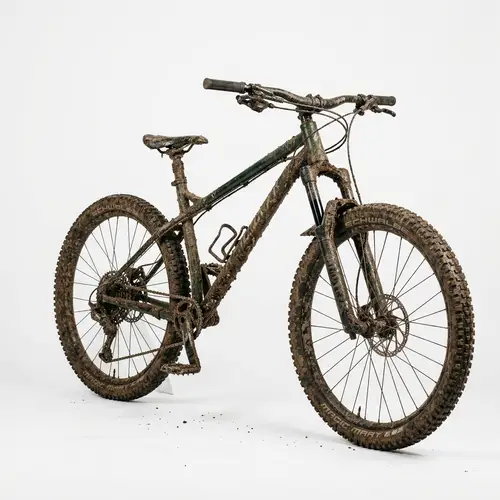 Muddy Bicycle Standing Out Against White Background