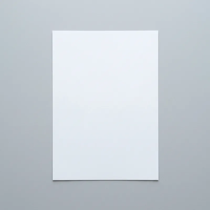 Pristine White Paper on Grey Background Pristine White Paper on Grey Background