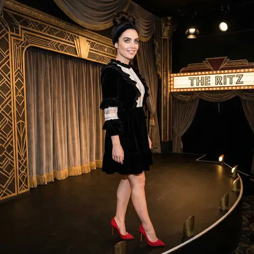 Distinctive Female Character with Vibrant Green Eyes and Red Heels