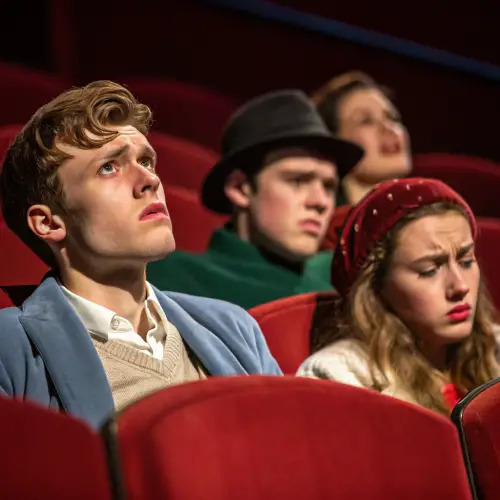 Dramatic Theater Scene: Expressions of Boredom