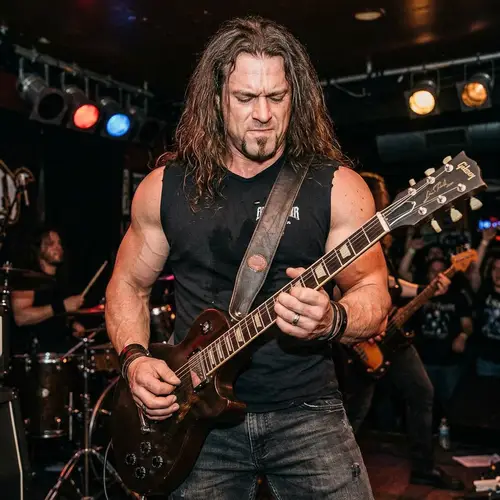 Muscular Guitar Player with Intense Facial Expressions