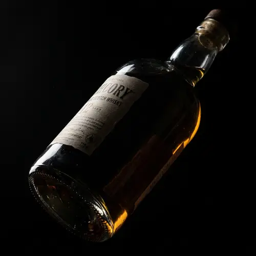 Stylish Dark Bottle Design with Hidden Label
