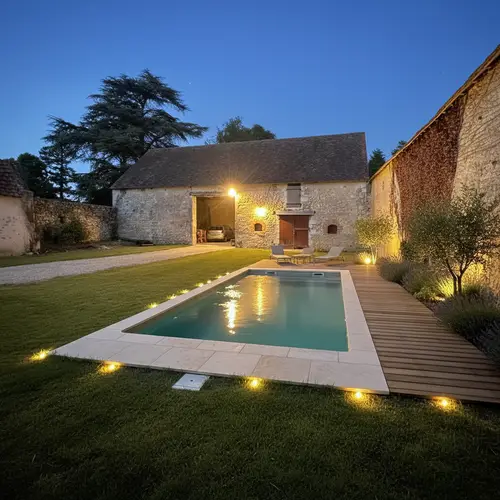 Cozy Home Courtyard with Pool and Barn at Dusk