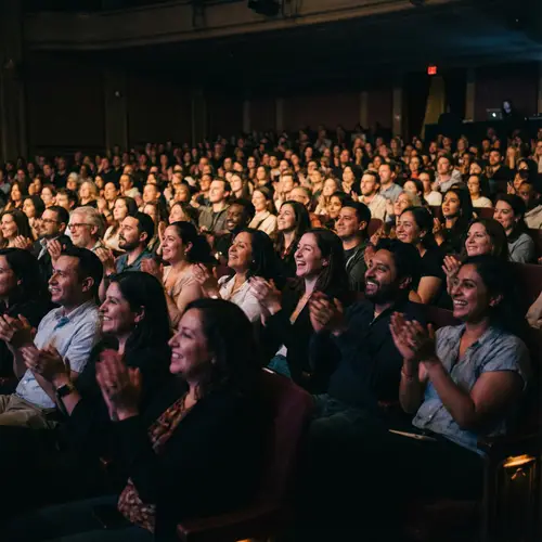 Diverse Audience Enjoying Theater Performance