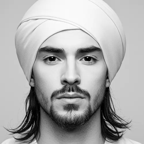White Male Headshot with Turban and Distinct Features