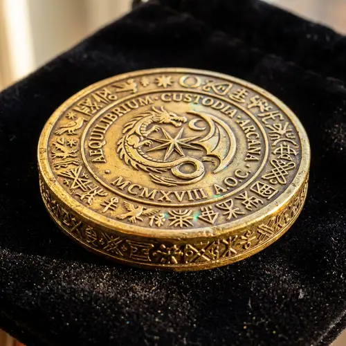 Intricate Gold Token with Engraved Symbols | Ancient Civilization