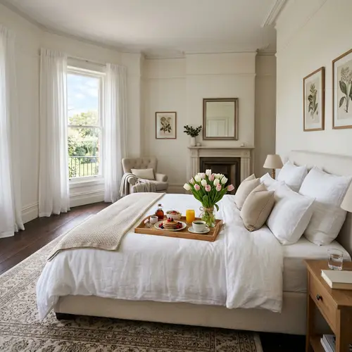 Elegant Bedroom with Breakfast and Tulips