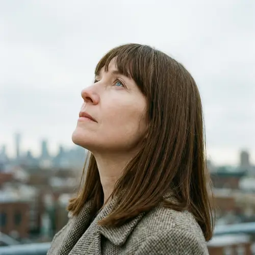 Closeup Portrait of 50-Year-Old Caucasian Woman with Blue Eyes