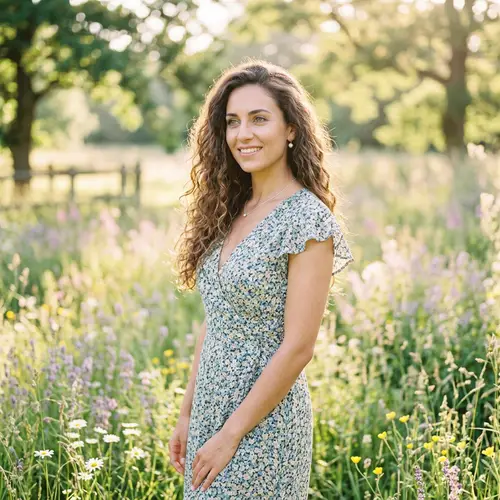 Elegant Model in Sun-Drenched Park with Wildflowers