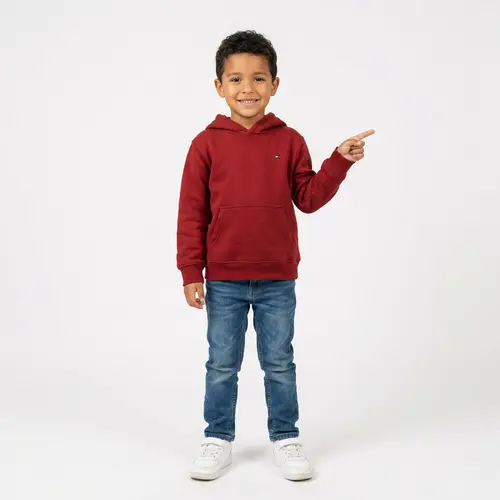 Young Hispanic Boy in Red Hoodie and Blue Jeans