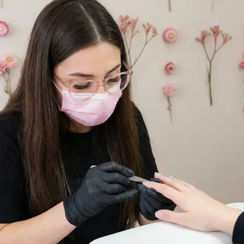 Professional Manicurist with Dark Brown Hair | Beauty Expert