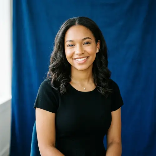 Elegant Senior Portrait on Blue Background