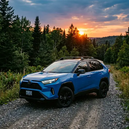 Sleek RAV4 in Vibrant Blue at Sunset