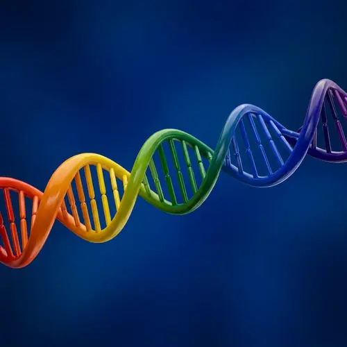 Rainbow-Colored DNA on Blue Background