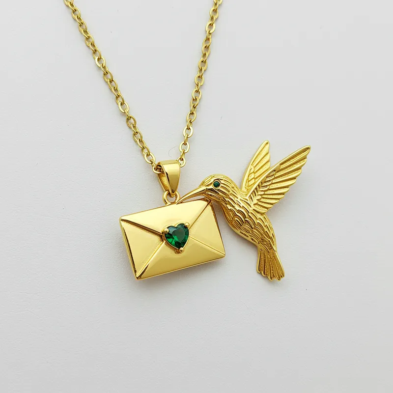 Gold Hummingbird Necklace with Emerald Heart Pendant