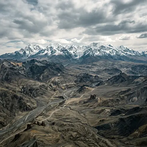 Vast Barren Terrain & Snow-Capped Mountains | Nature Landscape