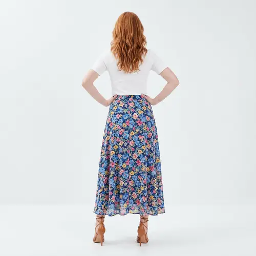 Chic Floral Skirt Fashion: High-Heeled Sandals Style