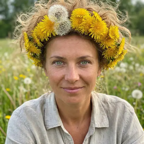 Unique Blonde Woman with Dandelion Hair | Enchanting Green Eyes