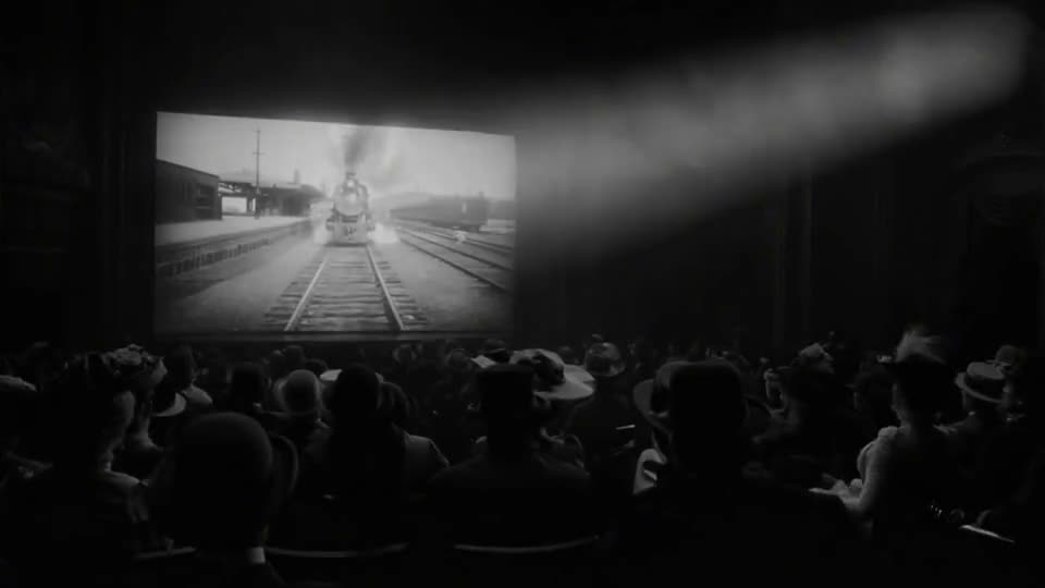 A steam train bursts out of the screen